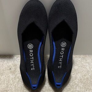 Rothy's Black Flats with Vibrant Blue Accent